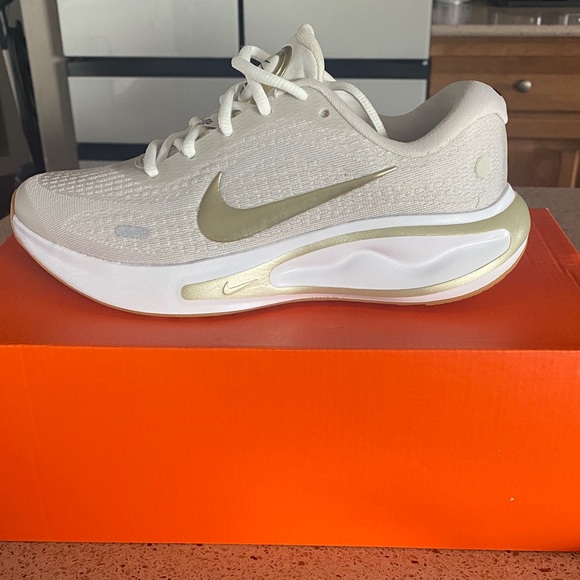 Nike Shoes - Nike Women's Cream and Gold Athletic Shoes